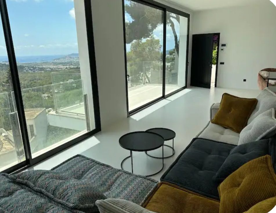Living room seating area with panoramic sea view